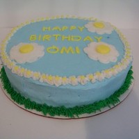Happy Birthday Omi This a white cake with buttercream filling and decorated all in buttercream. The receiver of the cake LOVES daisies. TFL