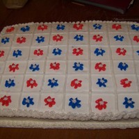 Red And Blue Flowers This is a triple chocolate fudge cake decorated in buttercream frosting.