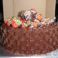 Chocolate Straberry Celabration Cake A favorite of people to order for special deserts and special occasions. All chocolatewith chocolat basket weave ganache. Berries dipped in...