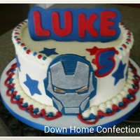 9 Inch Tier With Modeling Chocolate Cutouts 9 inch tier with modeling chocolate cutouts.