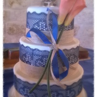 3 Tier Weeding Cake With Gumpaste Calla Lillies And Sugar Veil Lace With Burlap Ribbon 3 tier weeding cake with gumpaste Calla Lillies and Sugar Veil lace with burlap ribbon