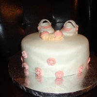 Baby Girl Simple yellow cake with vanilla pudding filling. MMF & gumpaste decorations (Idea from cake central)