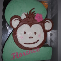 Florences 2Nd Birthday Vanilla cake with b/c, sugar sheet flower and name. Hand cut the name and flower, freehanded the monkey. Tfl