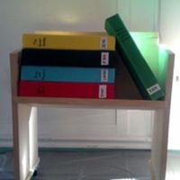 Retirement For A Librarian The Book Cart Is Made Out Of Wood Boo Lol But Each Book Is A Different Flavor Cake On Its Own Cake Board *Retirement for a librarian. The book cart is made out of wood (boo, lol) but each book is a different flavor cake on its own cake board.