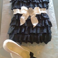 Little Black Dress This was made for my daughter's birthday. She found a dress and wanted to duplicate it. Decorations are fondant except the brooch. The...