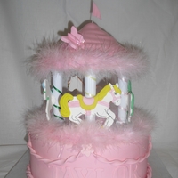Carousel Baby Shower Loved making this cake. The horses are gumpaste with fondant accents attached with royal icing.