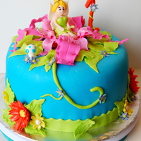 Tinkerbell Cake Chocolate Cake, Cream Cheese Buttercream with Chocolate Chips. Everything else, fondant baby!