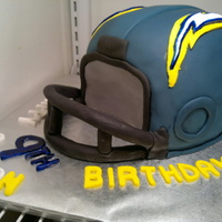 Football Helmet Chargers helmet cake made for my nephew's birthday. First time making this and was guided by several cakes I saw here on CC. Chocolate...