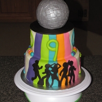 Disco Skate Party Cake this was made for a skate party with a disco theme - disco ball is rice crispy treats covered in fondant , i cut the dancers with my cricut...
