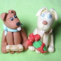 My First Figures First, thank you Aine2 for the fantastic tutorials on the dogs and miniature roses. They are made of a 50/50 fondant, gumpaste mixture. TFL...