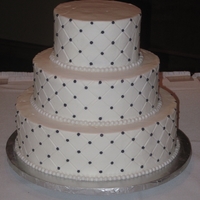 Natalies Wedding Cake. All buttercream with quilt pattern and purple sugar pearls. When I dropped off the cake, the cake topper was not there...hopefully they...