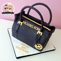 Michael Kors Purse Cake Carved from an 11 X 14 cake. I am very very pleased with how this turned out.