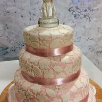 1St Holy Communion Cake The recent cake I helped decorate for a dear friends daughter's 1st Holy Communion. The flowers n leaves are made of fondant with...