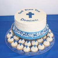 Baptism Cake And Mini Cupcakes Butter cream with fondant accents...finally getting some use out of my cricut cake :) This was inspired by the invitation.