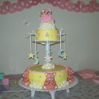 Baby Shower Cake I made this for one of my niece's baby shower...Mini teddy bear cake pan (wilton)...stars and moons are fondant with royal icing......