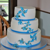 Pinwheel Themed Wedding Cake Teal & Green pinwheel themed wedding cake made to celebrate our friend's wedding. Bride wanted all buttercream - boy is that...