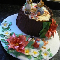 Three Little Fat Mice I assembled this. the last Christmas cake gift, on Christmas Eve as it is a maderia cake with a ganache filling and coating.