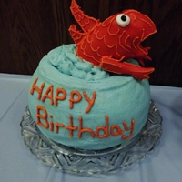 Dr. Seuss Cake The main fish from Dr. Seuss, the fish bowl is cake, the fish is rice crispies molded and covered with fondant.