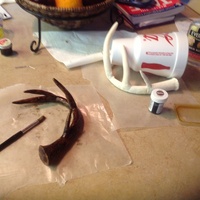 Antlers I made the antlers out of gum paste. While they are hardening, I put them on a large cup or Crisco can to get a rounded shape. When dry, I...