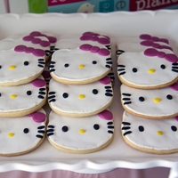 Hello Kitty Cookies cookies iced with royal icing. fondant eyes, nose, whiskers and bows
