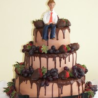 Tiered Graduation Cake W/model Of Graduate Tiered Graduation Cake w/model of Graduate. He graduated 2 yrs ago & my sister cbbenz1972 & I both made this cake. Dipped...