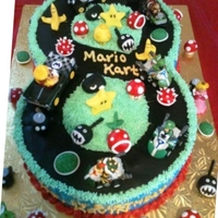 Mario Kart "8" Track Mario Kart Cake all edible except the actual karts; they're the birthday boys' toys.