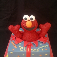 Elmo Cake Elmo cake. Elmo is made of rice krispy treat.