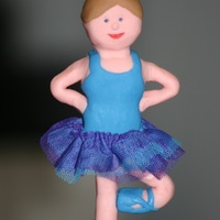 Ballerina A ballerina to top the main cupcake in a group for my daughters 3rd birthday :)