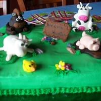 Hunters Baby Shower This was for my daughter-in-laws baby shower. It is a half chocolate half vanilla cake with buttercream icing. The farm animals are fondant...
