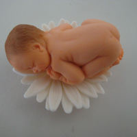 Baby On Daisy 50/50 fondant and gum paste baby & Daisy