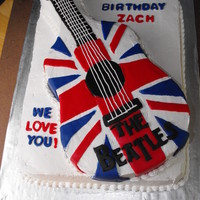 Beatles Guitar Cake Made for my nephew, a HUGE Beatles fan and a guitar-player. All buttercream with fondant accents