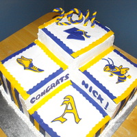 Nick's Graduation Half vanilla butter cake, half cherry chip. Iced in buttercream with fondant decorations. Many thanks to fellow CC'ers for the design...