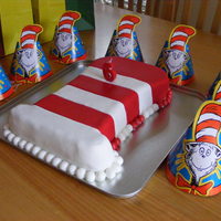 Cat In The Hat Hat! A Cat in the Hat cake for my sons 6th birthday. Chocolate cake with chocolate ganache covered in fondant. Jaffa's and Kool Mints...