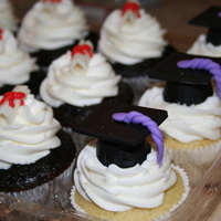 Graduation Cupcakes Made the caps using reeses candy and fondant. The diplomas were fondant too!