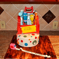 Handy Manny Cake Handy Manny Cake made for 1 year old, everything is edible except for wodden dowels in cakes and in some of the tools, toolbox is made from...