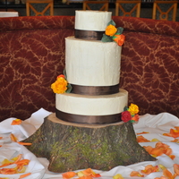 Fall Themed Wedding Cake My first Wedding cake, and my first all buttercream cake.alot of stress but everyone was happy with it..