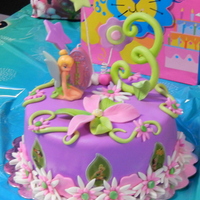 Tinkerbell 3Rd Birthday Cake This one was for my daughter's other sister. She loved it so much and really took her time eating the flowers and playing with the...