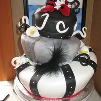 Topsy Turvy Wedding Cake This was a cake requested by my good friend, Her colors were black, white and red and she wanted a topsy turvy funky style cake. This is...
