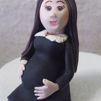 Wilma Waiting My first gumpaste pregnant figure made for my cousin, Wilma, who was getting a bit tired of waiting for the happy event. Figure finished...
