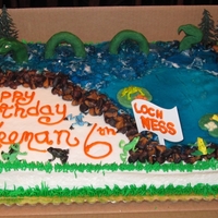 Loch Ness Monster Frog Pond Cake My son asked for a Frog pond cake with a loch ness monster. This is what I came up with. Nessie, cattails, leaves and rocks from moeling...