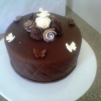 Quilting - Choc Cake Practice cake - wanted to try quilting. Choc cake with white choc ganache with fondant decorations. TFL