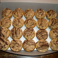 Sinfully Delicious Vanilla cupcake with caramel butter cream and chocolate drizzle