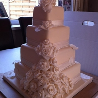 Roses Ivory Roses on a 4 tier square cake, wish had got a better pic!