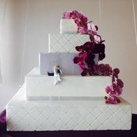 Floating Wedding Cake This cake was HUGE! The bottom tier was 3ft by 3ft. It was made of wood and extremely heavy.