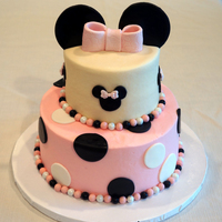 Minnie Mouse Themed Cake And Cupcakes This was inspired by several versions of this type of cake here on CC and on several other sites that my client sent to me. This was for...