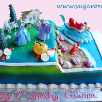 Cinderella And Ariel Theme Cake Cinderella Is On The Top Half Of The Cake Overlooking Ariels Beach Cinderella and Ariel Theme Cake. Cinderella is on the top half of the cake overlooking Ariel's Beach.