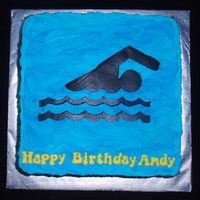 Swimmer Black fondant silhouette on buttercream.