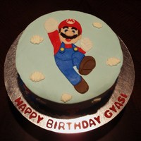 Super Mario Super Mario was made by tracing design on fondant and piecing together like a puzzle.