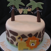 Baby Boy On Safari! Shower cake that was inspired by the nursery that has a safari theme. Lion was inspired by others I saw here and online...just had to wing...