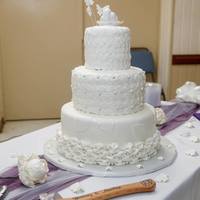 Matthew's And Brittney's Wedding Cake *I created this fondant covered wedding cake for my son and future daughter-in-laws wedding last March 2013. All three layers are chocolate...